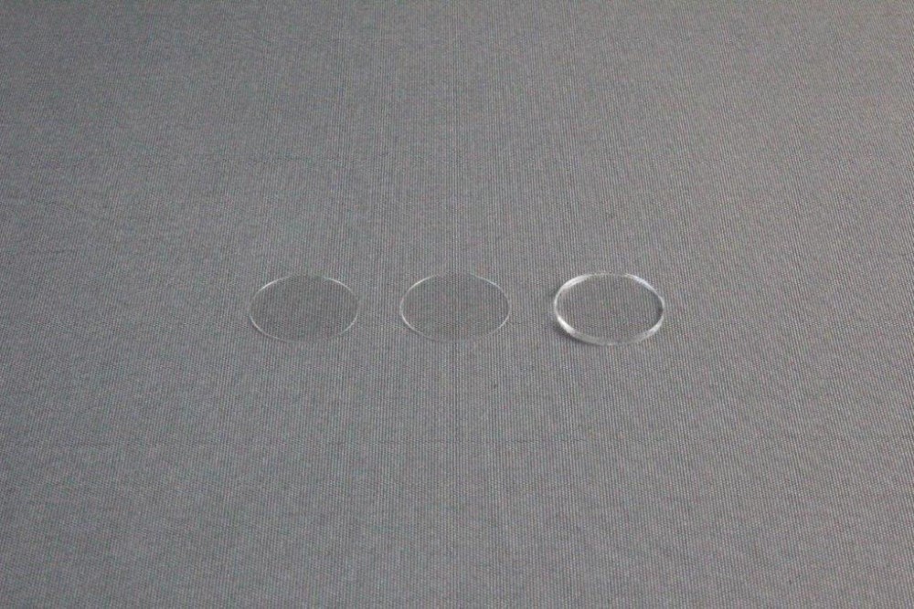 HR8-088/HR8-090 12 mm x 0.96 mm Thick siliconized circle cover slide (right) and HR3-278T Tecan siliconized circle cover slide (left) and HR3-277/HR3-279 12 mm x 0.22 mm Siliconized circle cover slide (middle)